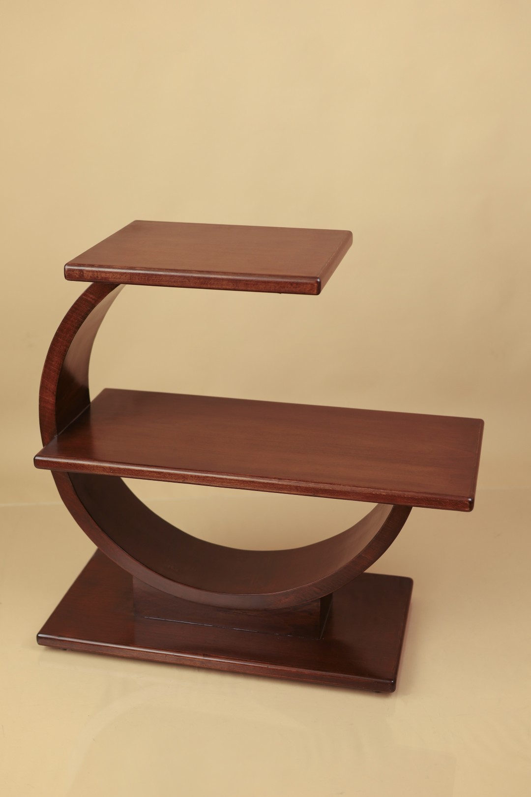 Round art-deco side table with two shelves set within a circular support